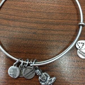 Seven Alex and Ani bracelets